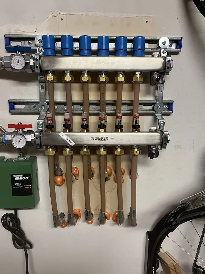 Plumber performing Water Heater Repair at a residential property in East Amwell